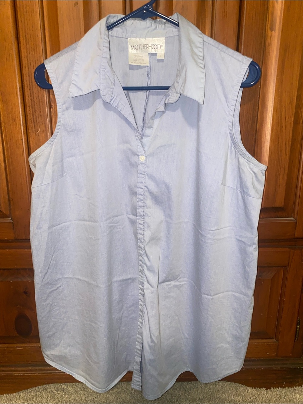 Motherhood Light Bluish/ Purple Sleeveless Maternity shirt.